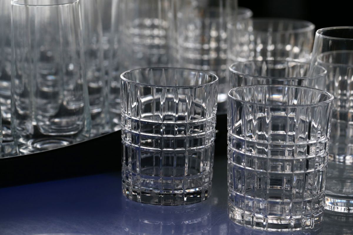 Close-up of crystal drinking glasses with a geometric cut design showing surface clarity