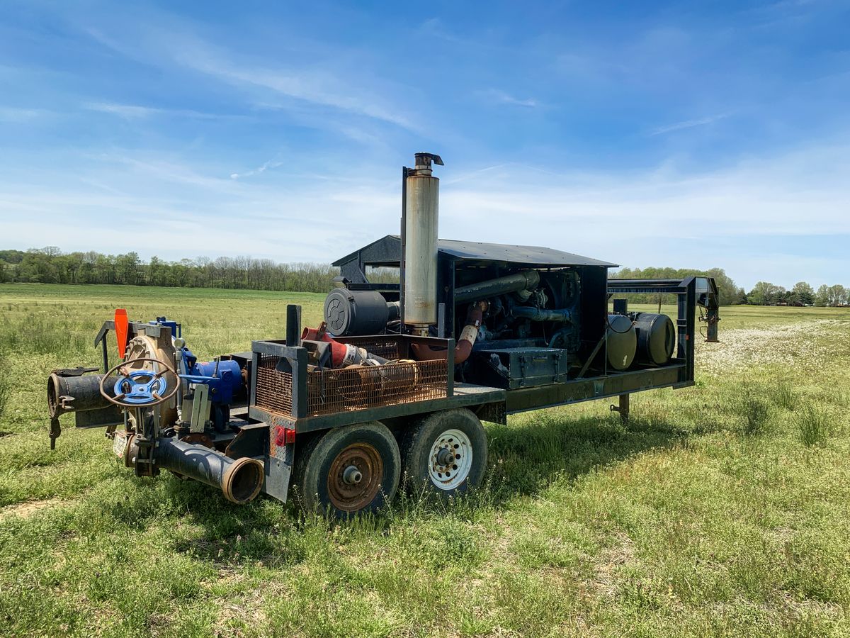 Engine-driven pump in a rural field, the well supply that determines how much iron reaches a softener in the first place