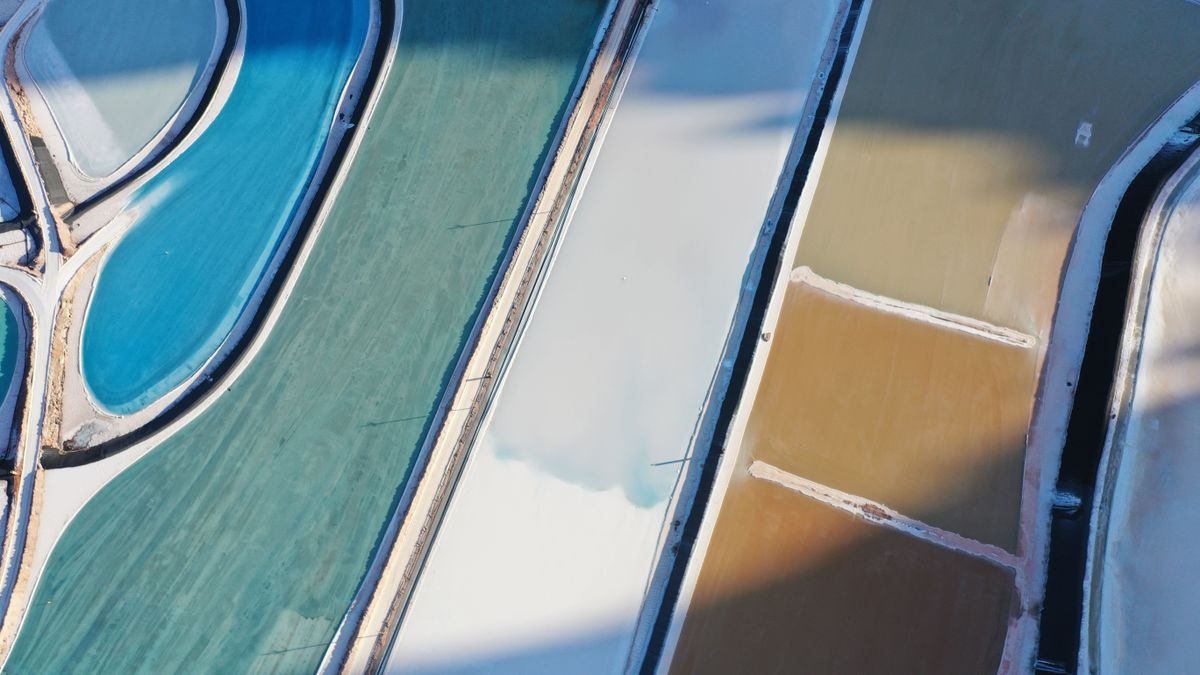 Aerial view of blue, green and brown potash evaporation ponds in Utah, where potassium chloride is produced