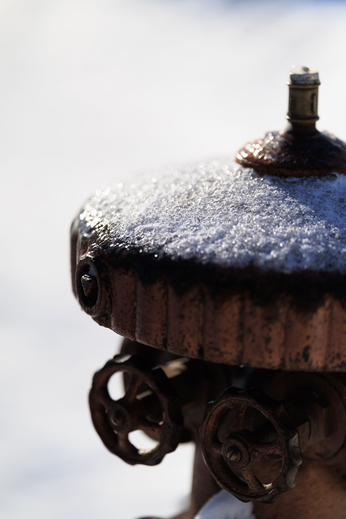 Frost crystals covering a water valve in freezing weather, the condition that can split a plastic softener valve body and produce a leak no seal kit will fix