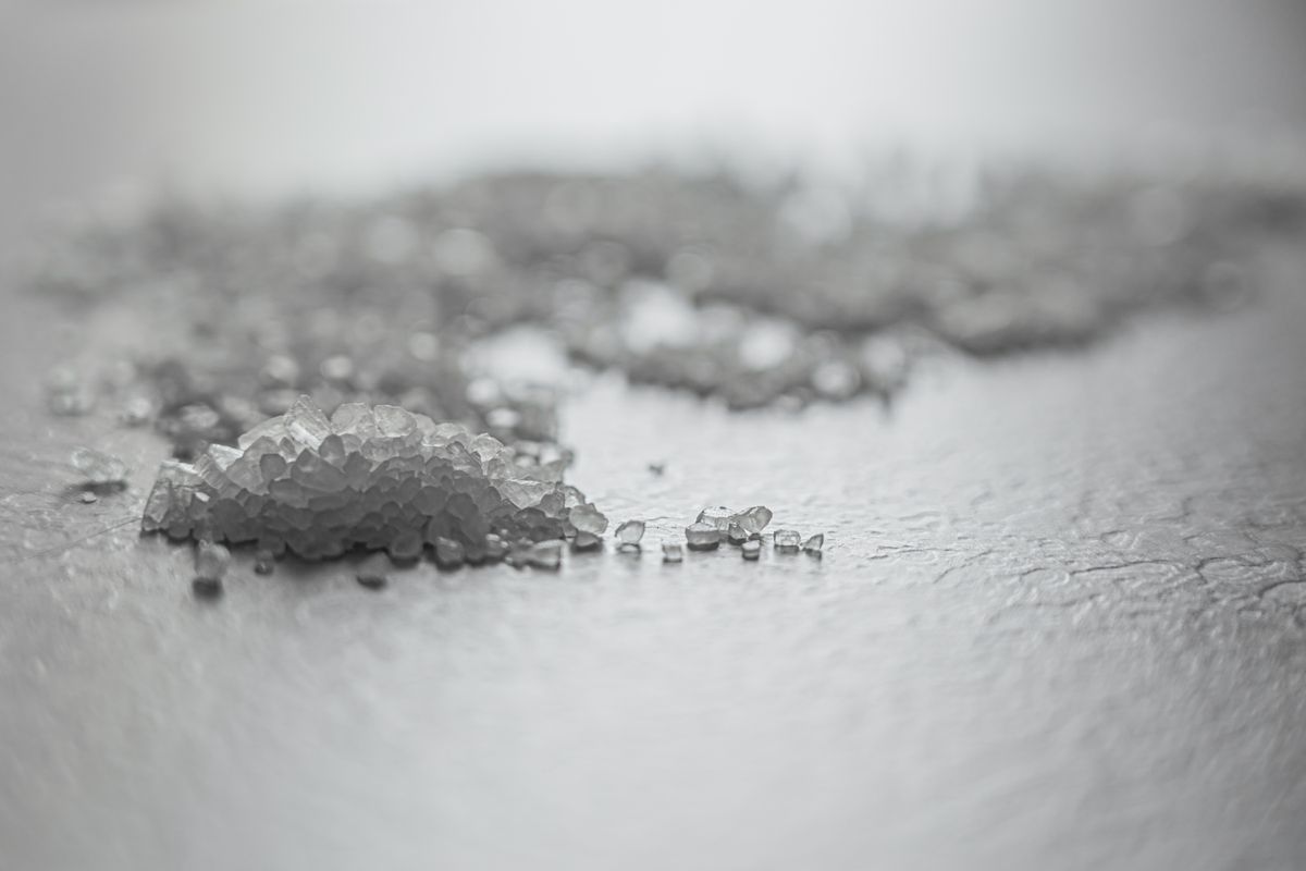 Coarse white mineral granules of the kind used as calcite neutraliser media