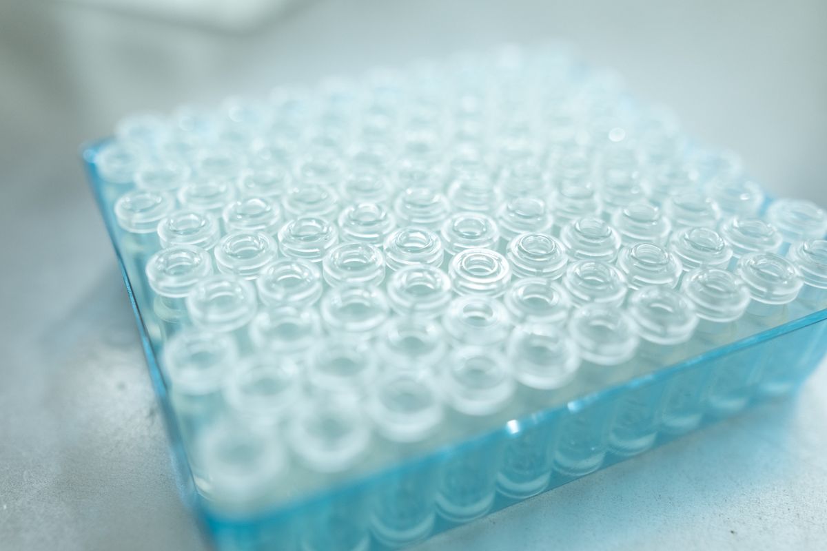 Tray of clear laboratory sample vials used for the water test panel that decides the salt free conditioner hardness limit
